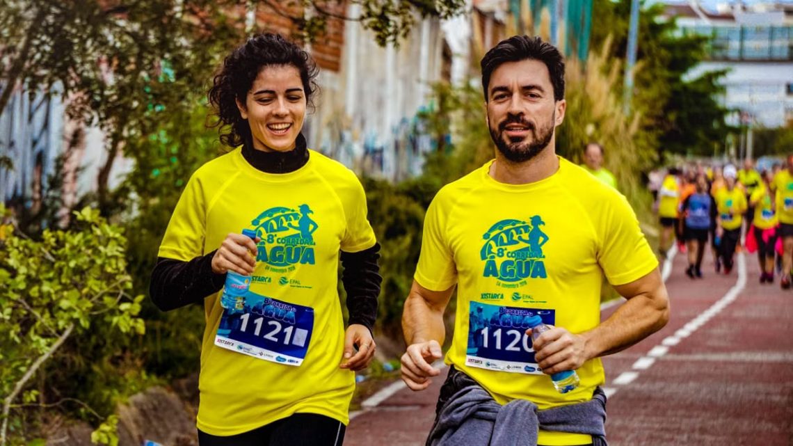 Two athletes participating in a marathon, showing determination and joy.